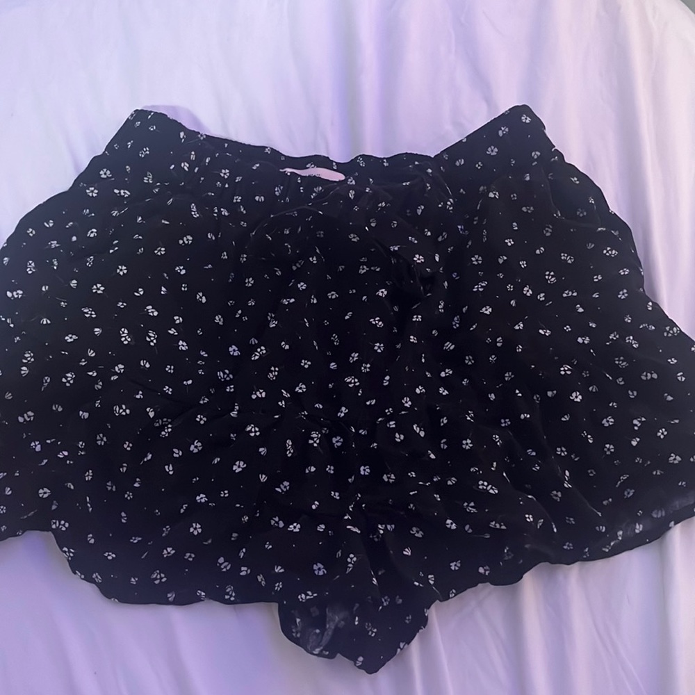 Black skort with floral pattern, Small , never worn